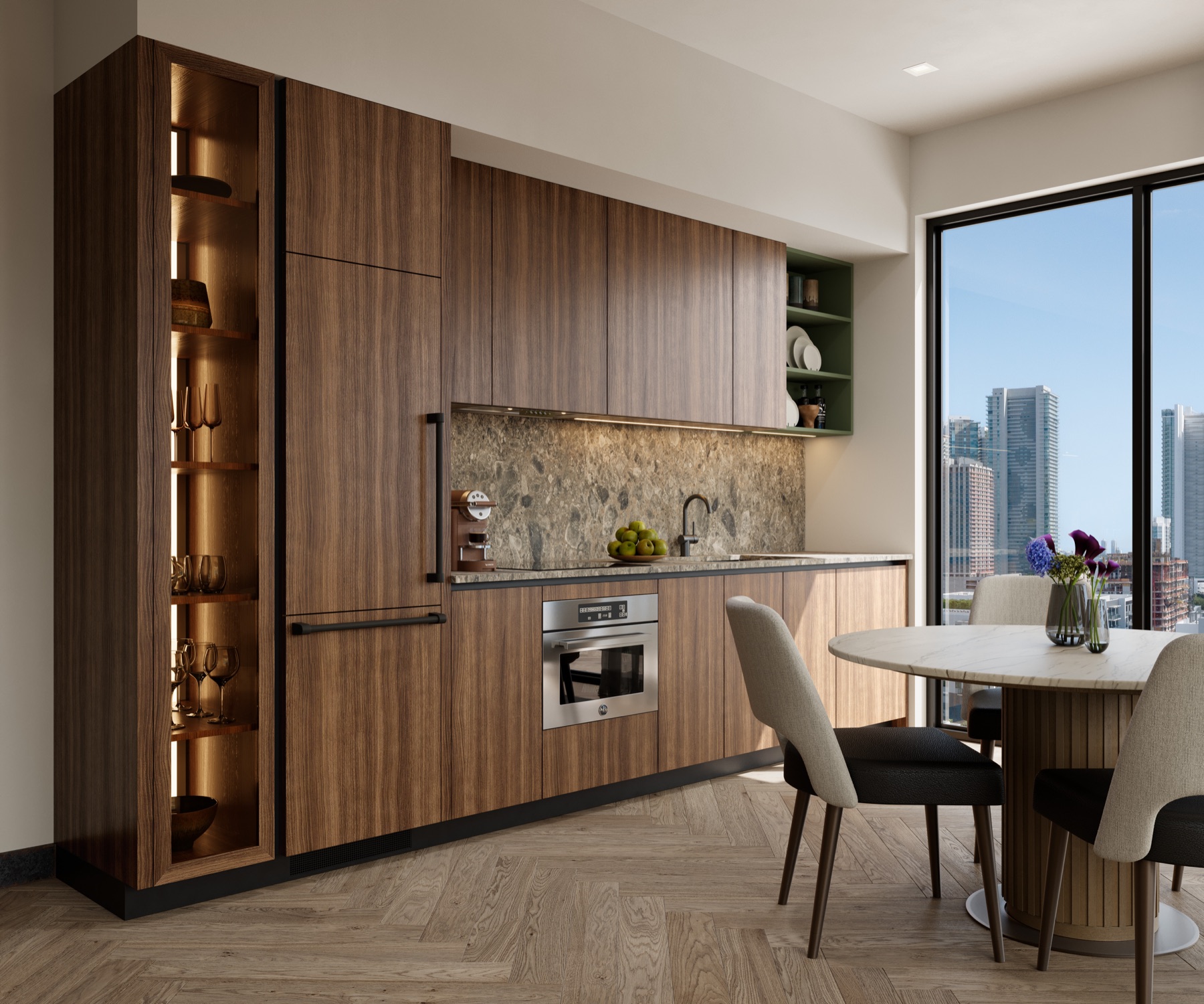 A kitchen at The Rider Residences Wynwood — warm walnut cabinetry with integrated lighting, a Cosentino Dekton stone backsplash, Bertazzoni appliances, and a round stone dining table beside floor-to-ceiling glass with skyline views.